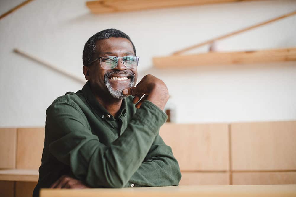 Man smiling after a dental cleaning