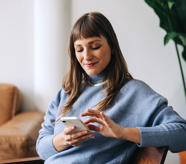 New patient booking an appointment on her phone