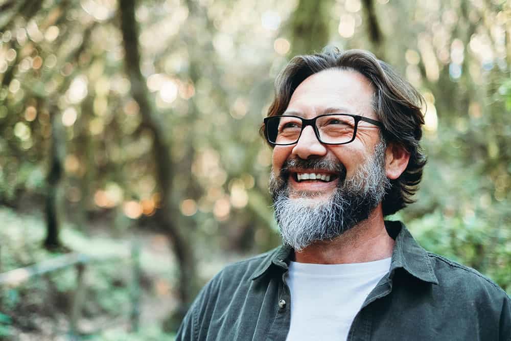 Man smiling outdoors
