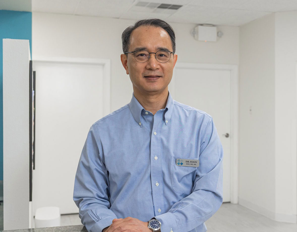 Dr. Sung Wook Yoon at the Blooming Dental office