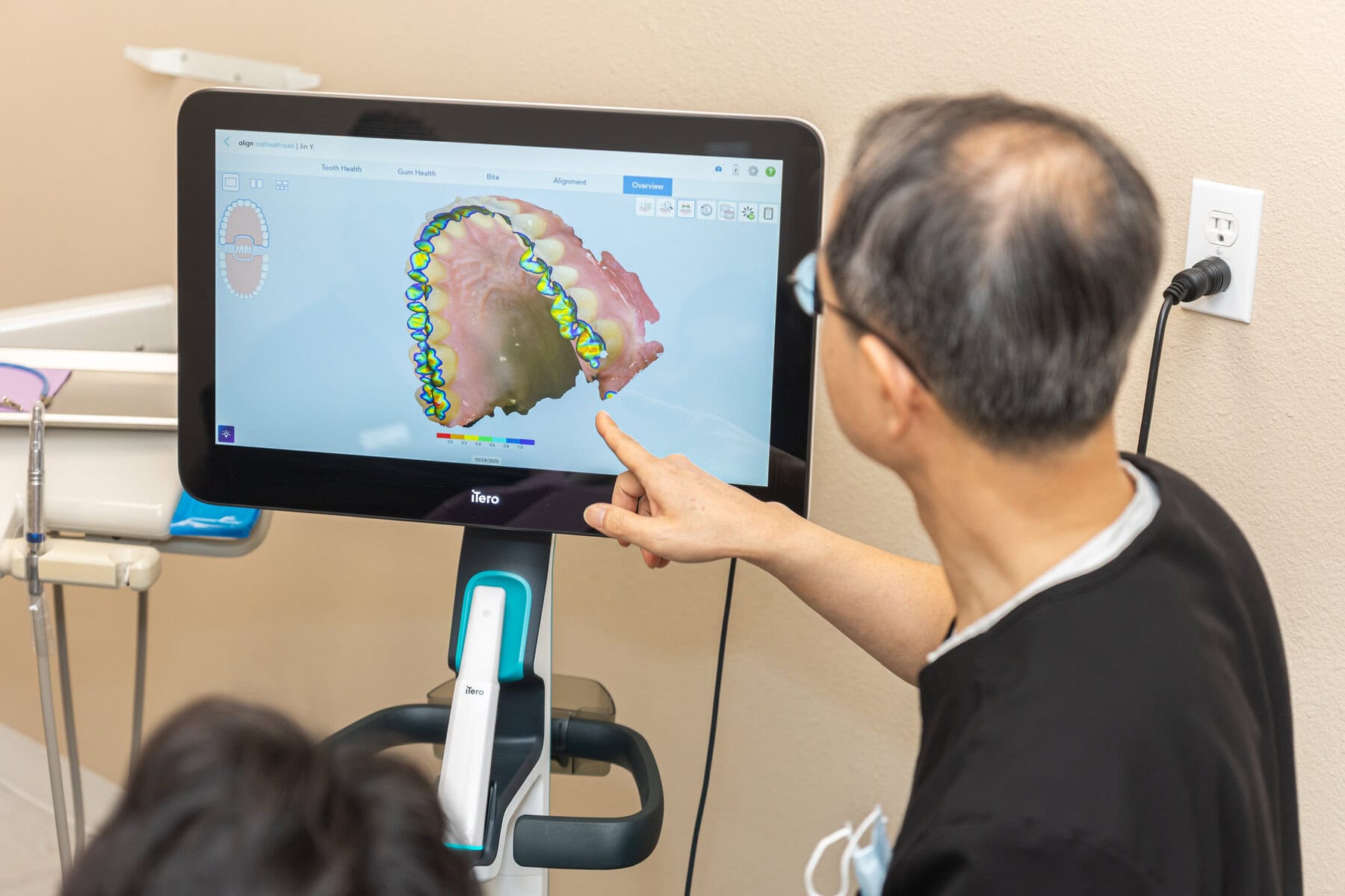 Patient viewing a 3D digital scan of her teeth