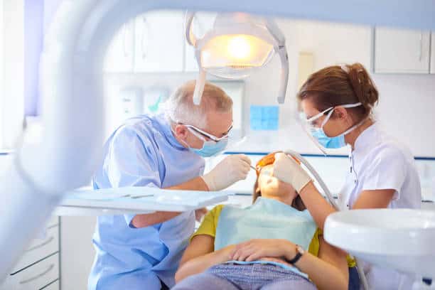 How a Prosthodontist Plans Crowns, Bridges, and Implants Together